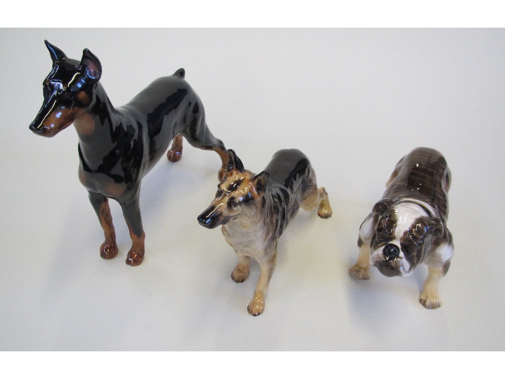 Appraisal: Three Royal Doulton dogs including Bulldog HN Alsatian HN and