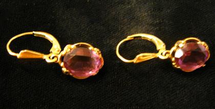 Appraisal: karat yellow gold and amethyst earringsDrop style oval cut amethyst