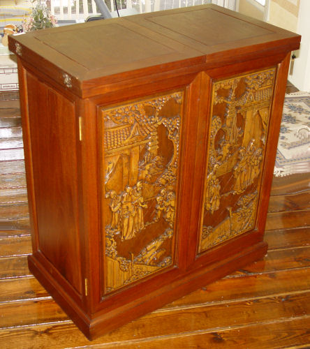 Appraisal: CHINESE HAND CARVED TEAKWOOD BAR Carved front back doors open