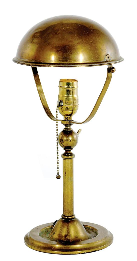 Appraisal: Brass ship's lamp half-round pivoting dome over turned stem on