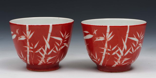 Appraisal: A pair of coral ground tea bowlsDaoguang - each decorated