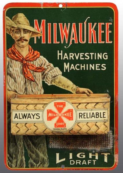 Appraisal: Tin Milwaukee Harvest Machines Match Holder Description Manufactured by Chas