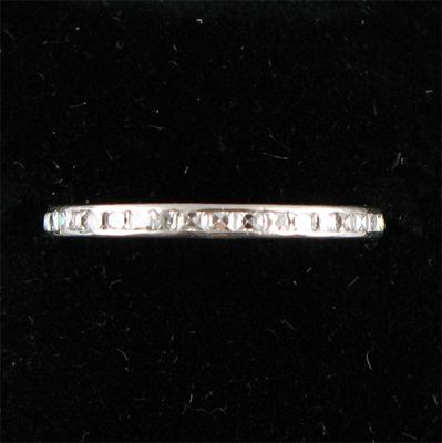 Appraisal: A diamond full circle eternity ring Set with calibre cut