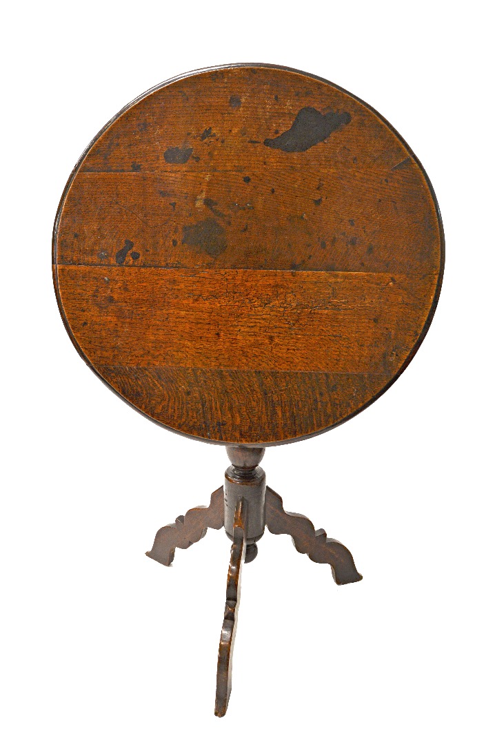 Appraisal: An early th century oak tripod table the plank circular