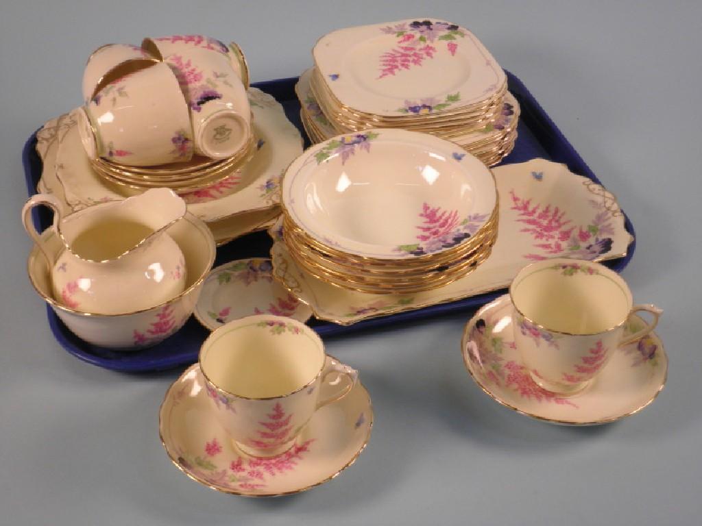 Appraisal: A Tuscan china part tea service printed with flowers and