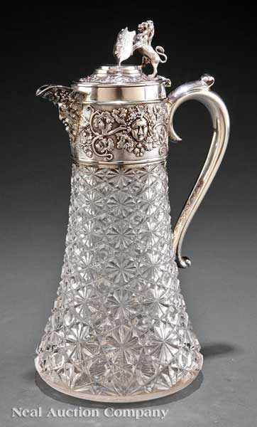 Appraisal: An Antique English Sterling Silver-Mounted Claret Jug Horace Woodward and