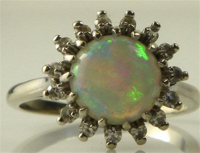 Appraisal: K WG diamond opal dinner ring mm rnd opal small