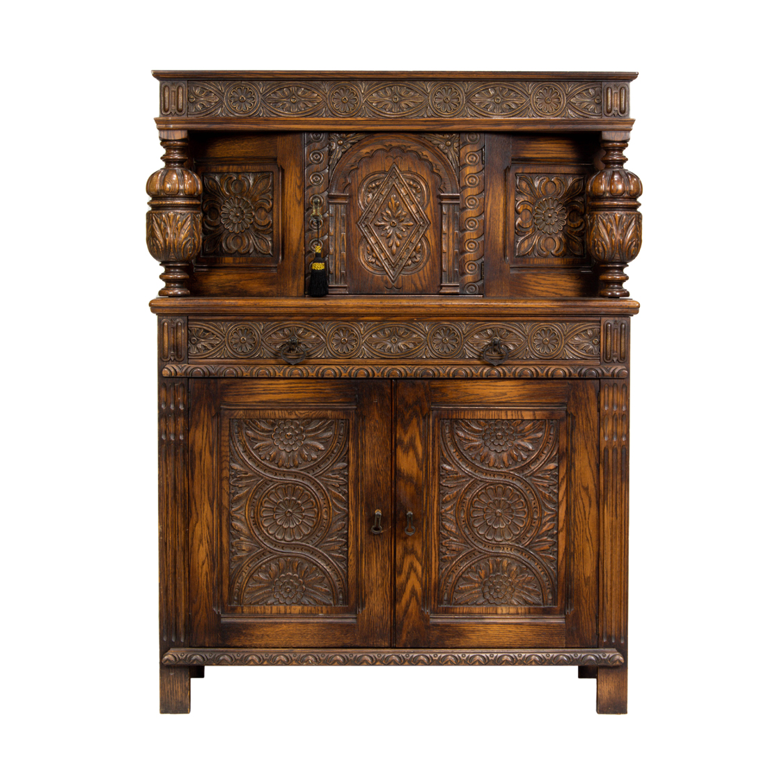 Appraisal: A JACOBEAN STYLE CUPBOARD A Jacobean style cupboard having a