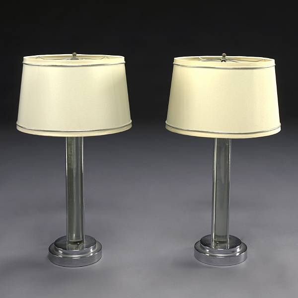 Appraisal: A Pair of Art Moderne chromed metal and glass table