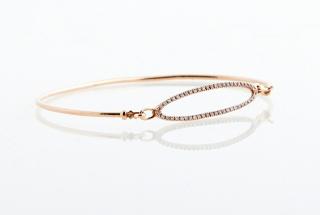 Appraisal: K Rose Gold Bangle Bracelet the center with an open