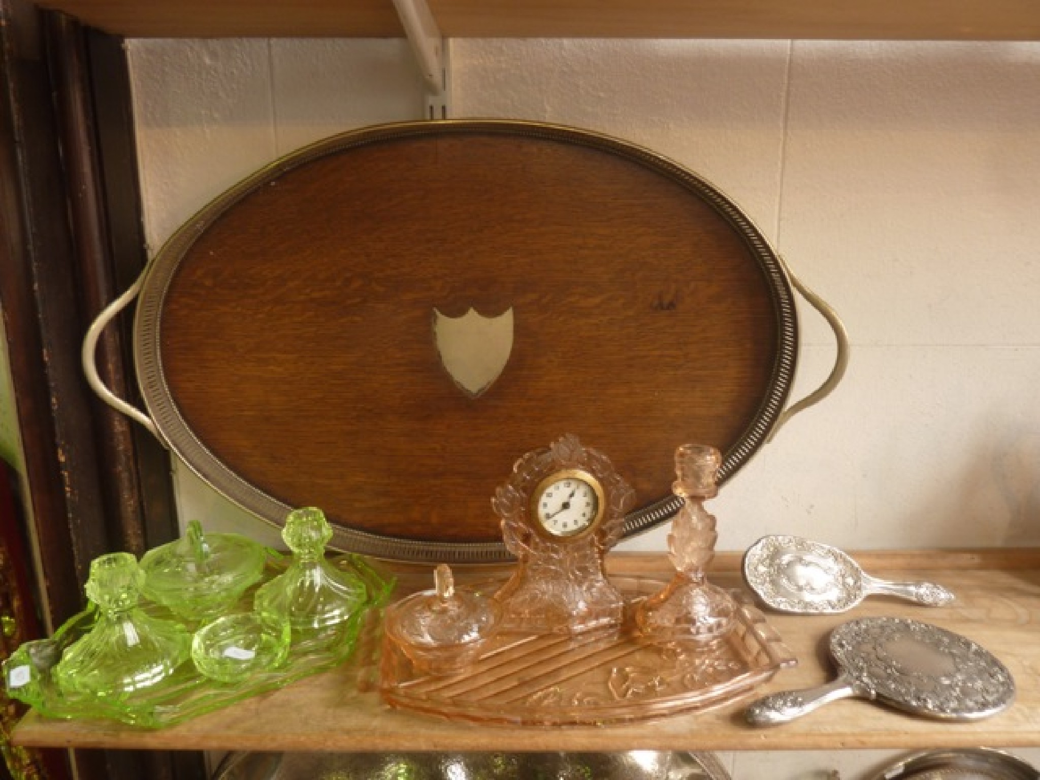 Appraisal: A substantial drinks tray of oval form principally in oak