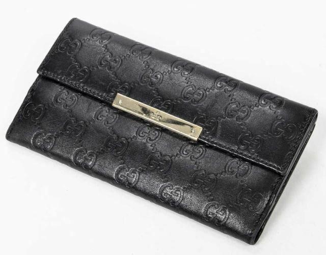 Appraisal: Gucci continental wallet in black Guccissima leather with silver-tone hardware