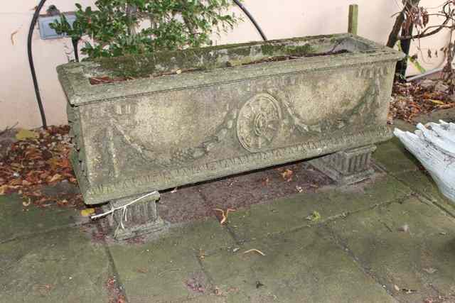 Appraisal: A PAIR OF HADDONSTONE RECTANGULAR TROUGHS with ribbon tied husk