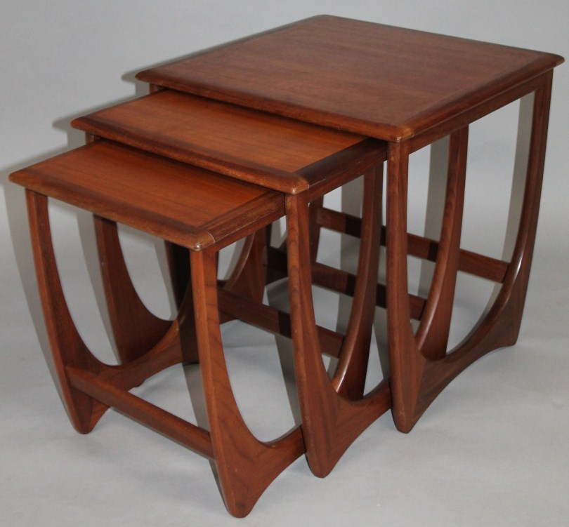 Appraisal: A nest of three late thC teak retro coffee tables