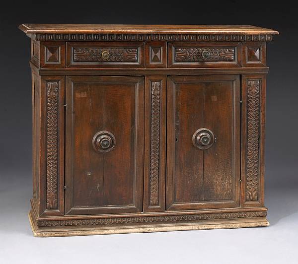 Appraisal: An Italian Baroque walnut credenza partially incorporating th century elements