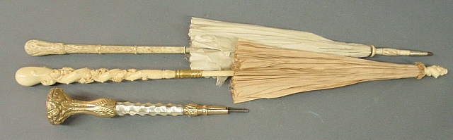 Appraisal: - Gold-filled and mother-of-pearl parasol handle l and two Victorian