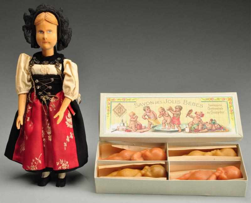 Appraisal: Lot of Swiss Wood and Soap Dolls Description Swiss wood