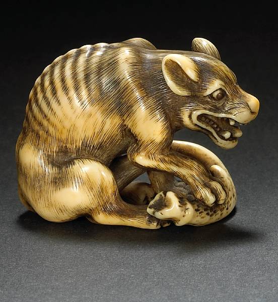 Appraisal: An ivory netsuke of a wolf By Yamaguchi Okatomo Kyoto