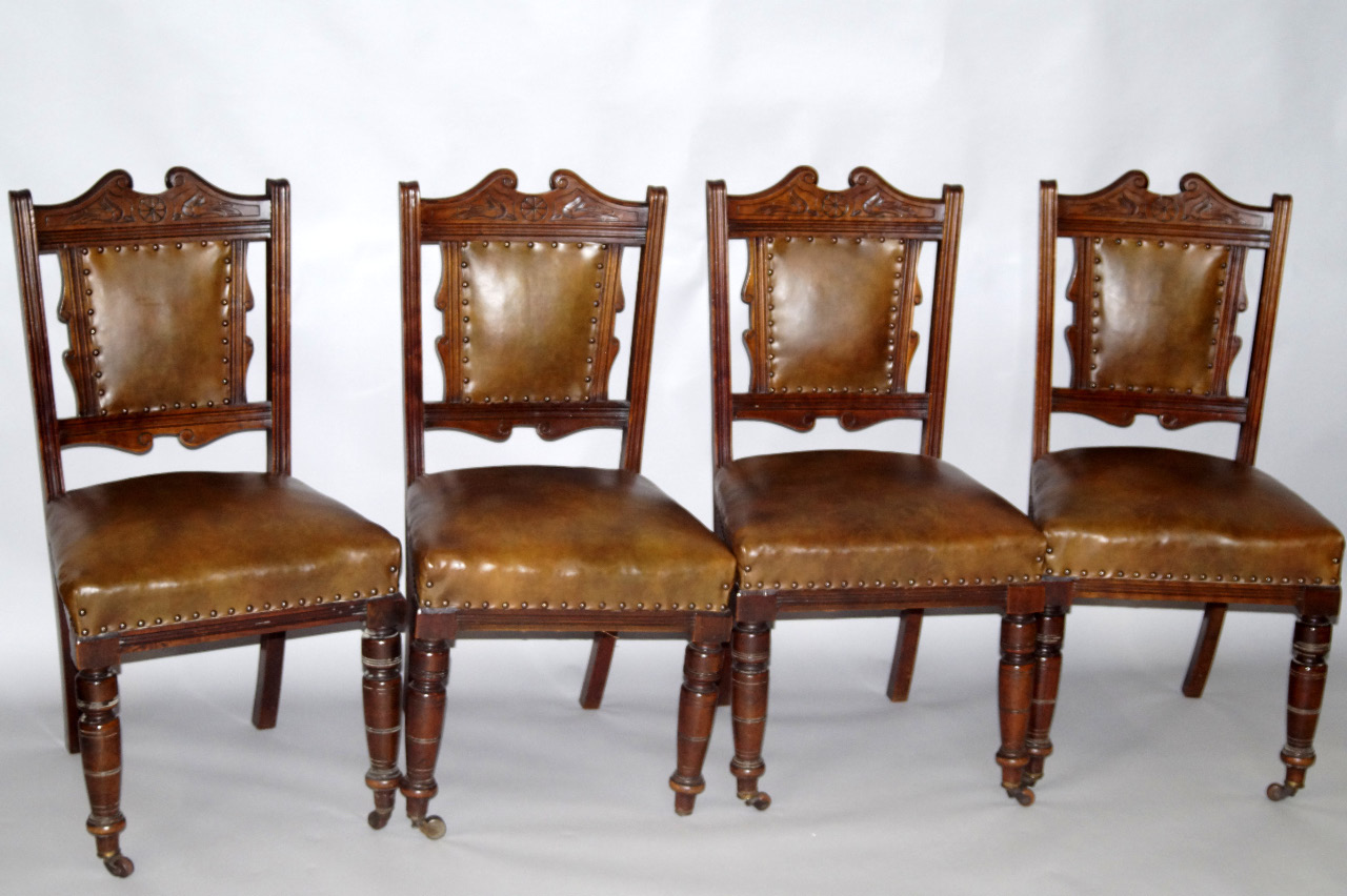 Appraisal: A set of four Victorian walnut single dining chairs with