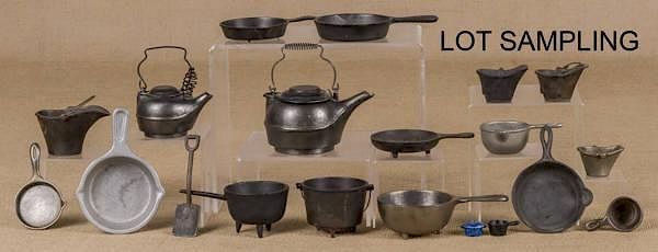 Appraisal: Large group of miniature cast iron cookware larg Large group