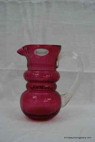 Appraisal: Fenton Glass Cranberry '' Cream Pitcher With a clear applied