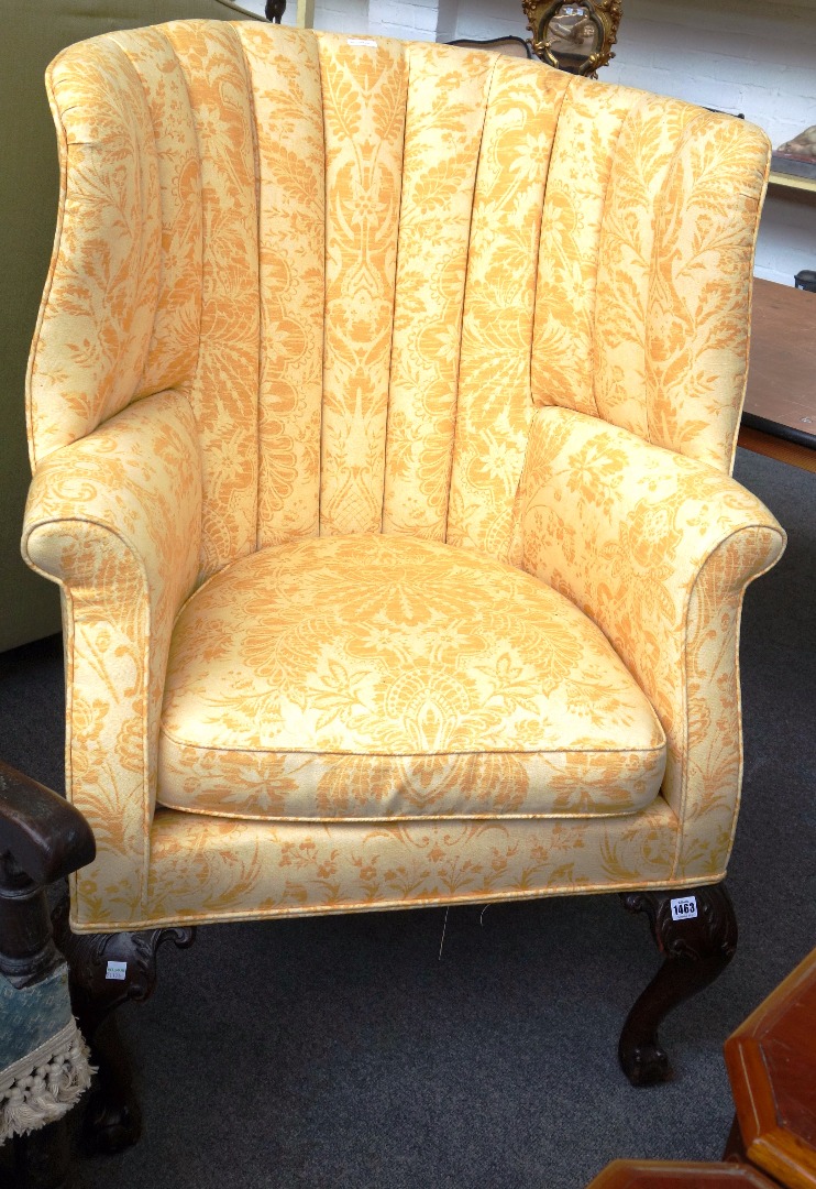 Appraisal: An th century style tub back armchair on acanthus capped