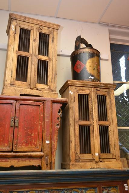 Appraisal: A PAIR OF HARDWOOD CABINETS WITH BAR DOORS