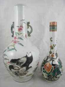 Appraisal: A Chinese slender onion shaped vase with overglaze enamel peacock