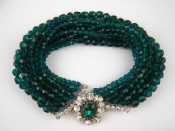 Appraisal: Christian Dior A faux emerald and diamond eleven strand costume