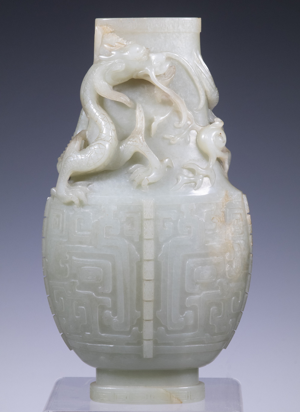 Appraisal: CHINESE QING JADE CARVED VASE Flattened Gu Form with writhing