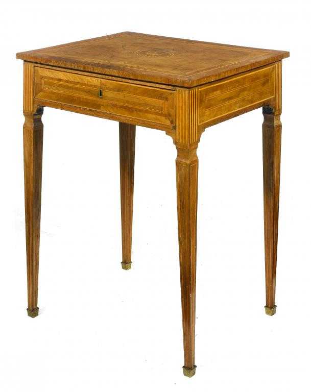 Appraisal: A NORTH ITALIAN WALNUT TABLE the quarter veneered top inlaid