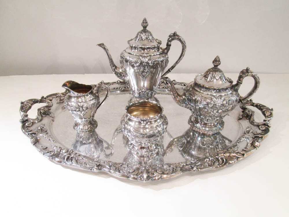 Appraisal: REED BARTON SILVER PLATED COFFEE AND TEA SERVICE INCLUDING TRAY