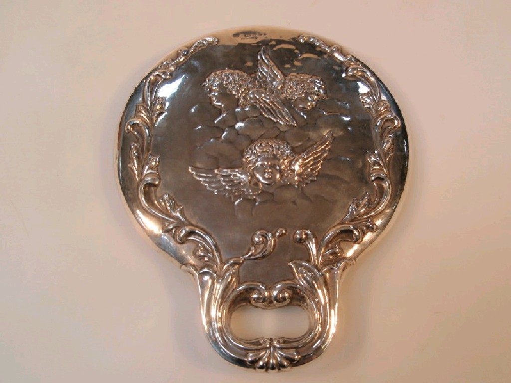 Appraisal: An Edward VII silver backed hand mirror embossed with angel