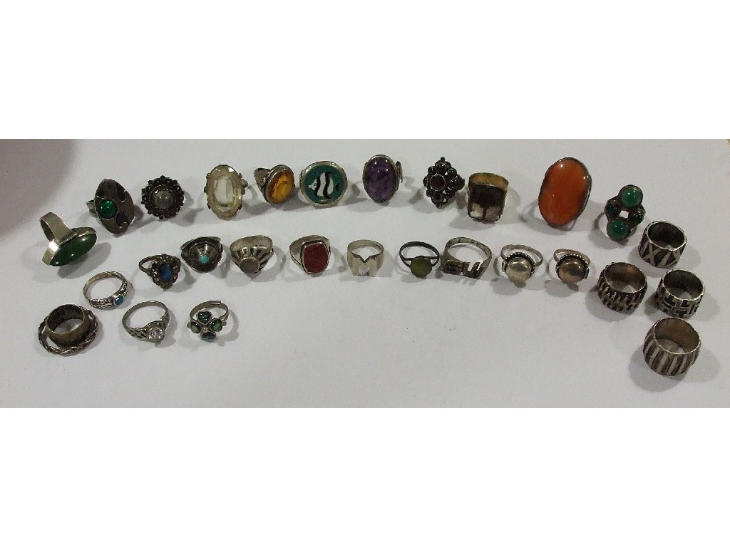 Appraisal: Twenty nine silver dress rings most set with stones to