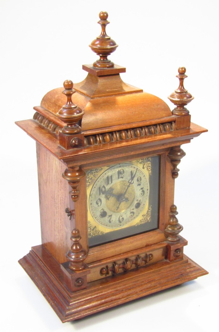 Appraisal: An Edwardian walnut cased mantel clock the domed top with