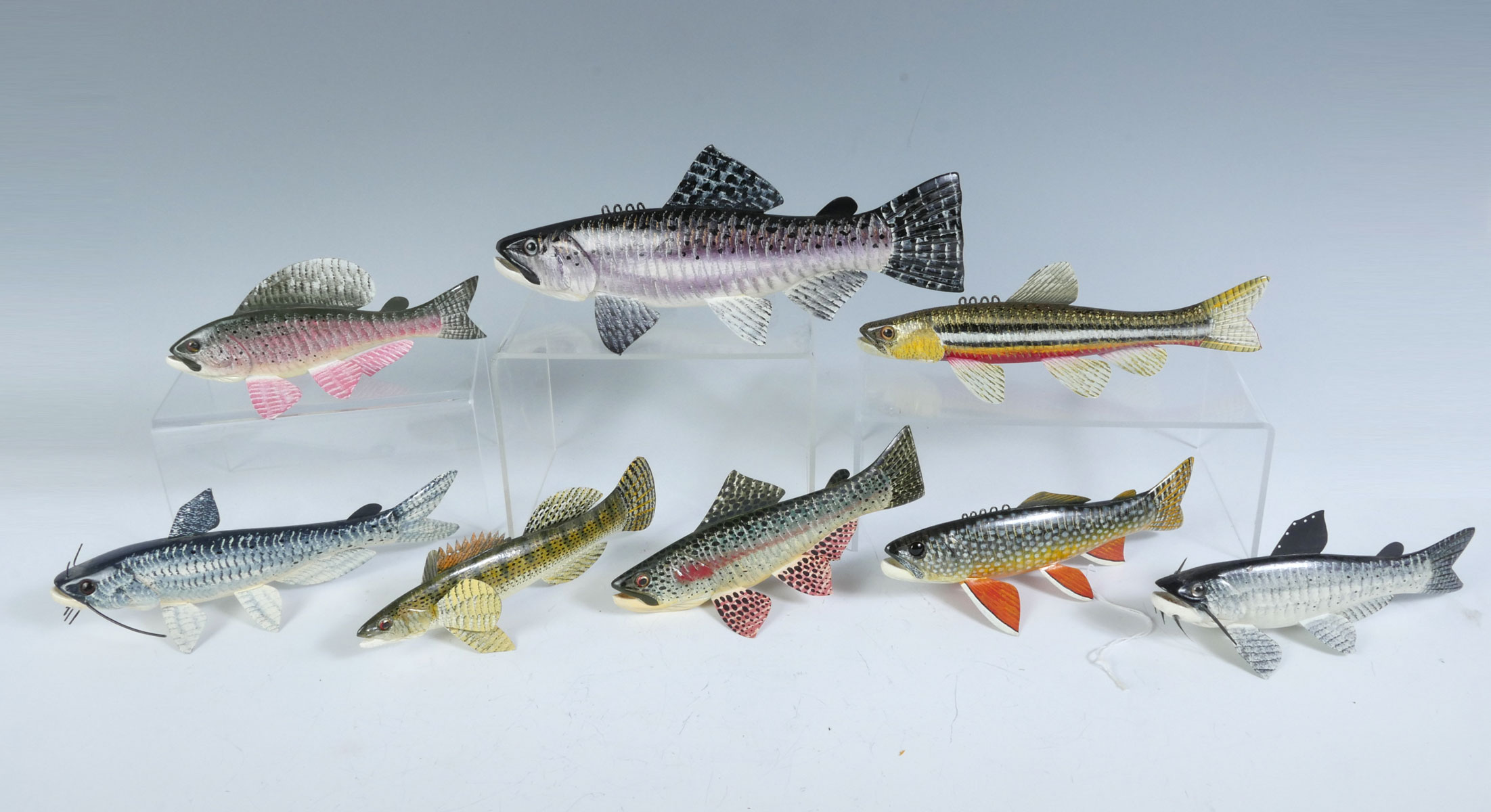 Appraisal: EIGHT PIECE CARL CHRISTIANSEN FISH DECOY LOT Large Spotted Trout