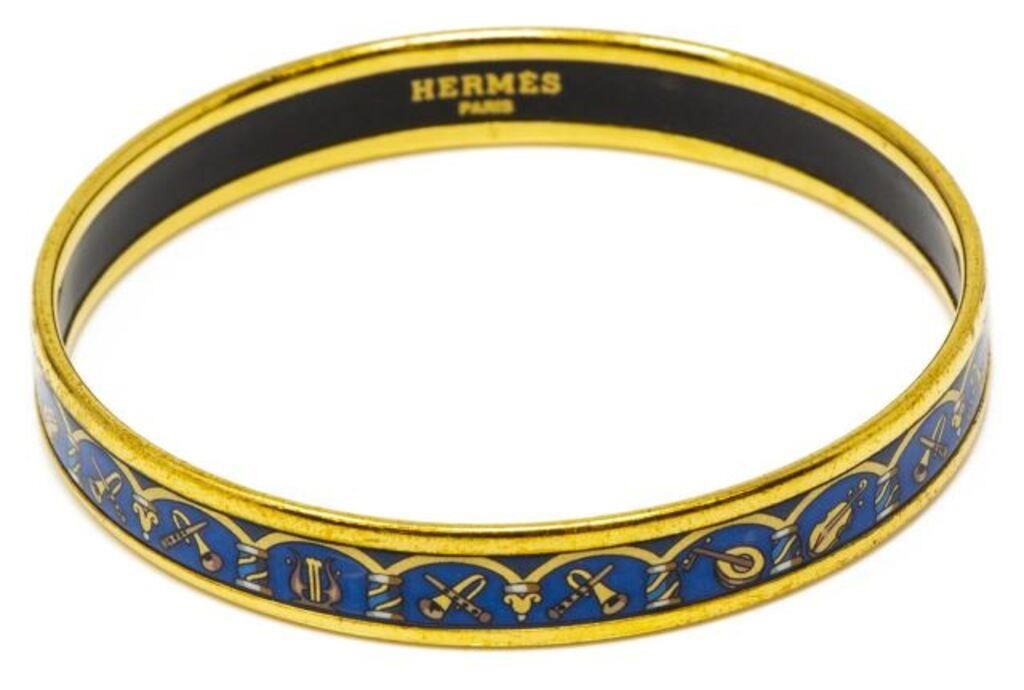 Appraisal: HERMES PARIS ENAMELED MUSICAL INSTRUMENT BRACELETHermes gold-plated and enamel bangle