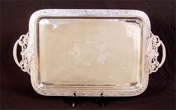 Appraisal: MERIDEN FIGURAL HANDLE SILVERPLATE TRAY Figural alligator and lion handles