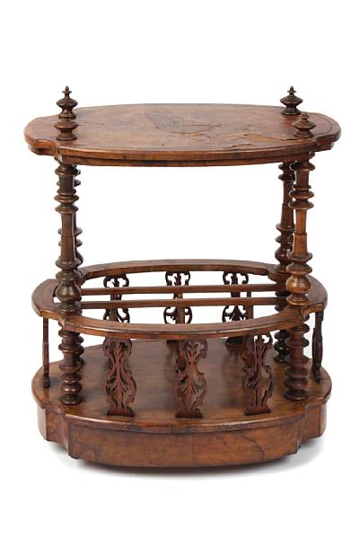 Appraisal: A Victorian walnut canterbury with restorations and repairs height in