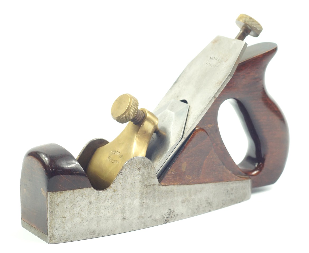 Appraisal: A Norris of London A dovetail coffin smoothing plane with