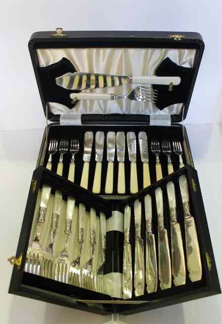 Appraisal: A CASED SET OF SIX BONE HANDLED FISH EATERS together