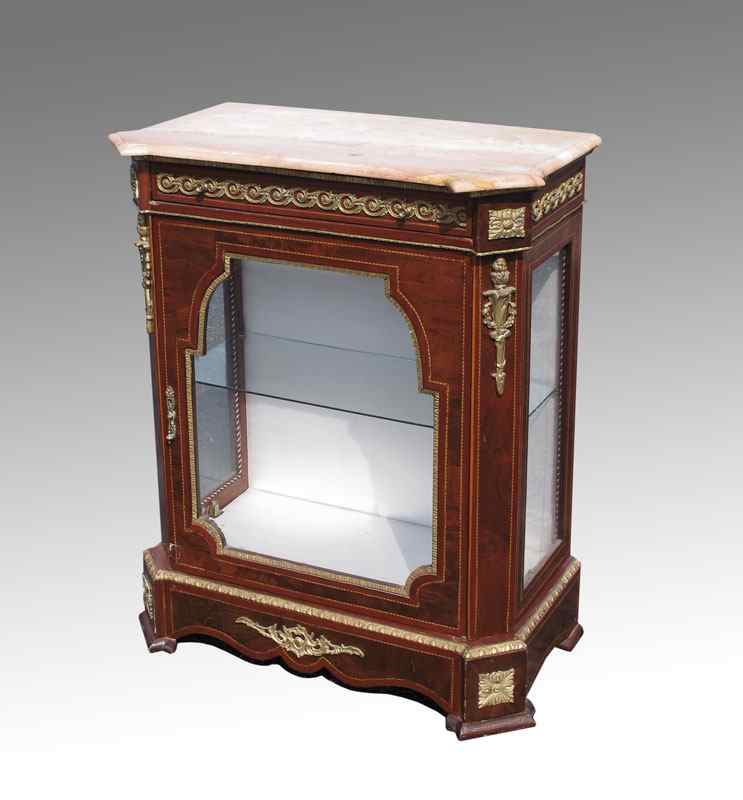 Appraisal: MARBLE TOP ORMOLU SIDE CABINET Shaped pink variegated marble top