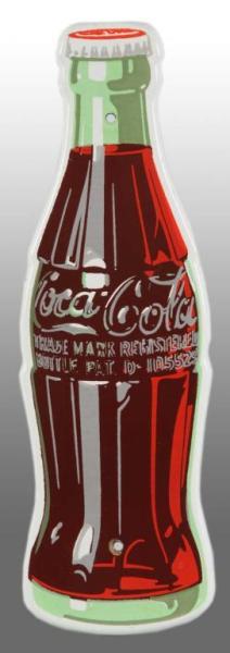 Appraisal: Porcelain Coca-Cola Die-Cut Bottle Sign Description s A few very