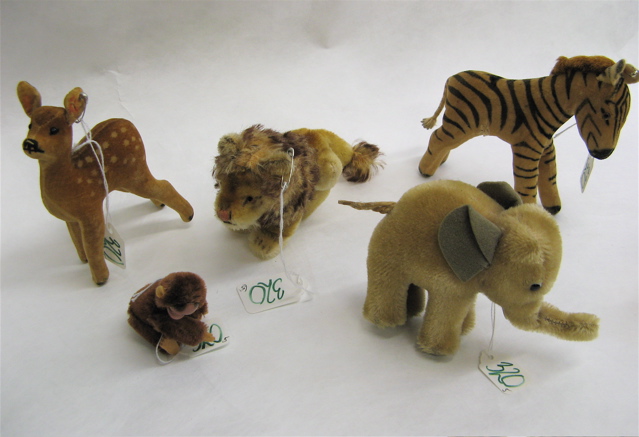 Appraisal: FIVE GERMAN STEIFF STUFFED ANIMALS including Zebra felt brown and