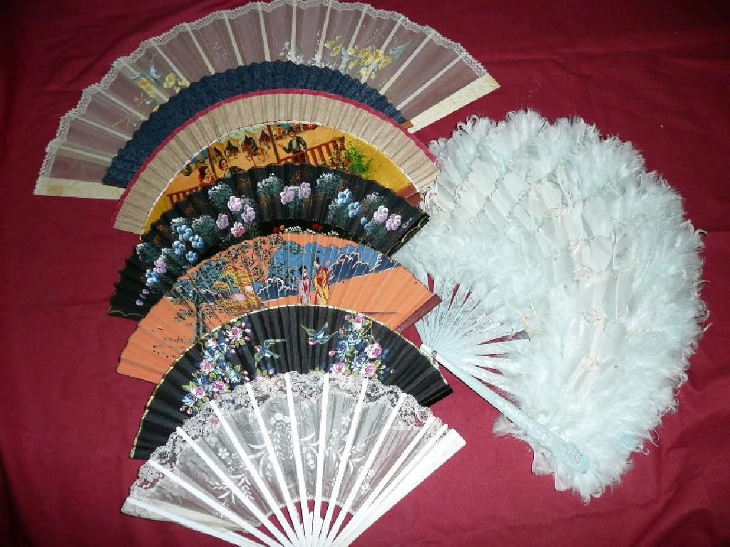 Appraisal: An assortment of decorative fans to include a blue feather