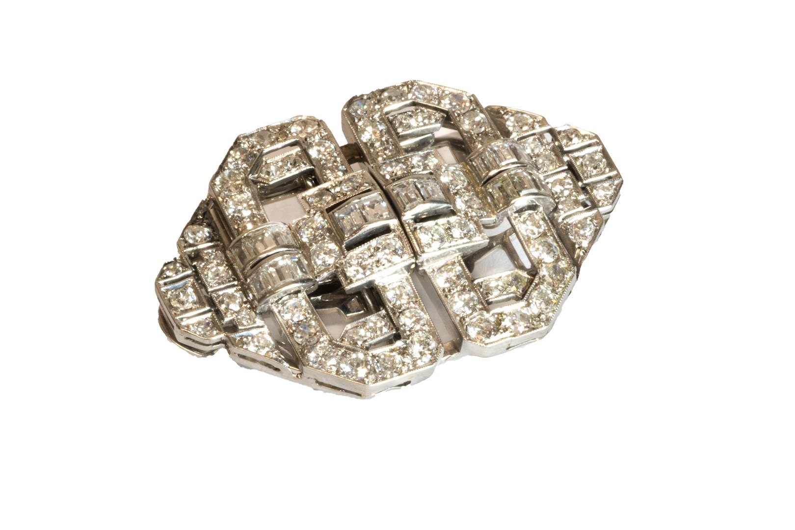 Appraisal: A diamond set double clip brooch mounted with circular cut