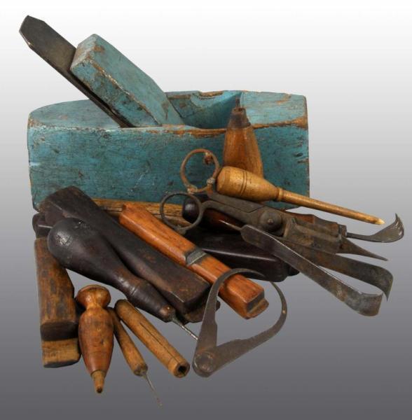 Appraisal: Lot of Primitive Tools Description Three metal and wooden Includes