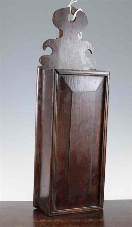 Appraisal: A mid th century oak candle box with a panelled