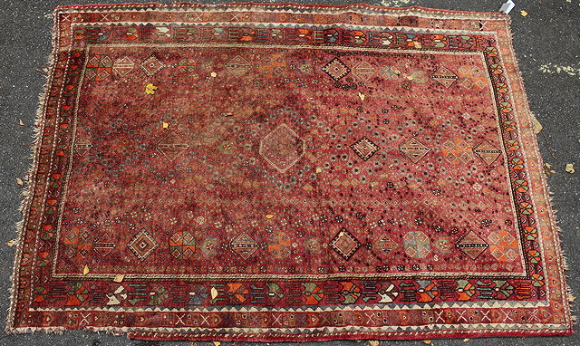 Appraisal: A MIDDLE EASTERN BRICK GROUND CARPET with three rows of