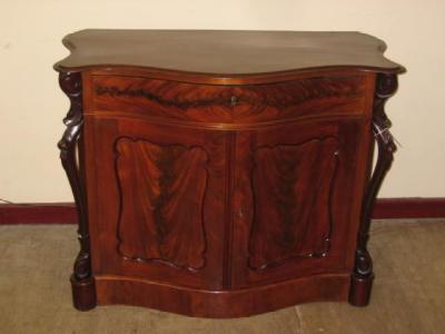 Appraisal: A VICTORIAN MAHOGANY CHIFFONIER of serpentine form with moulded edged